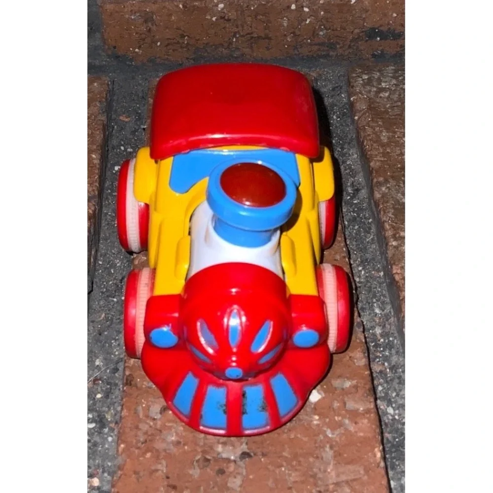 Red Yellow Blue Plastic Toy Train Engine with Cartoon Face Rolling Wheels 3
